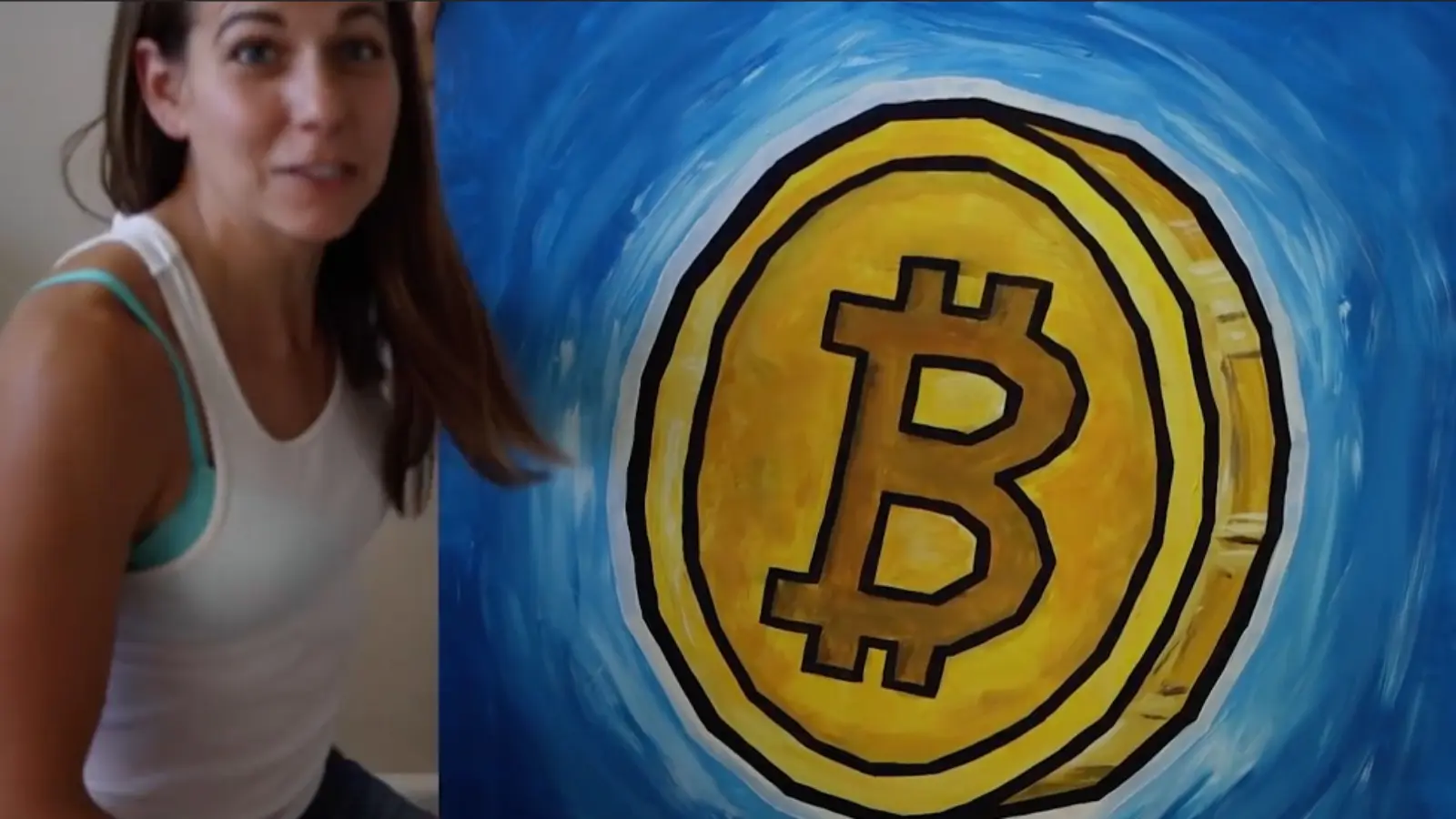 A photo of the Bitcoin event: The first painting sold for Bitcoin was by Ali Spagnola