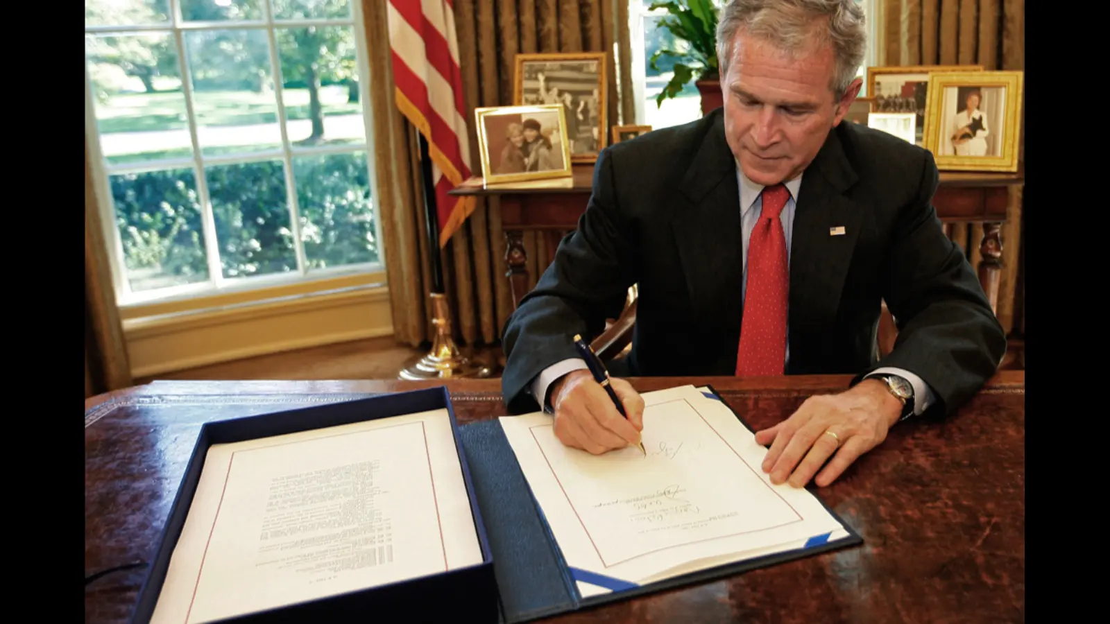 A photo of the Bitcoin event: The Emergency Economic Stabilization Act of 2008 was signed by President George W. Bush