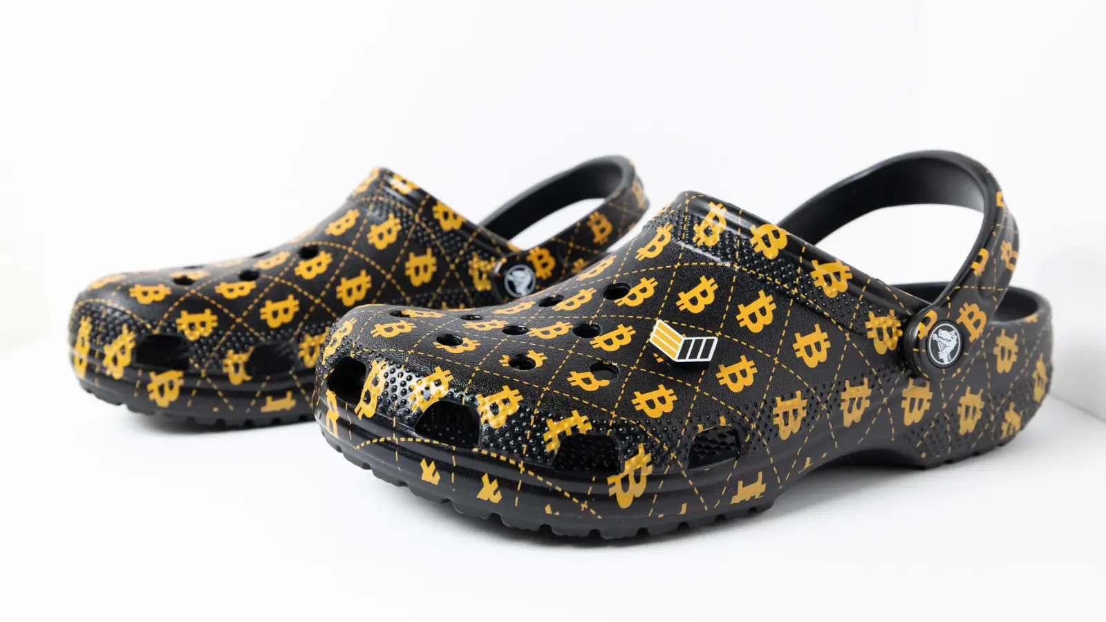 A photo of the Bitcoin event: Crocs released a Bitcoin themed shoe