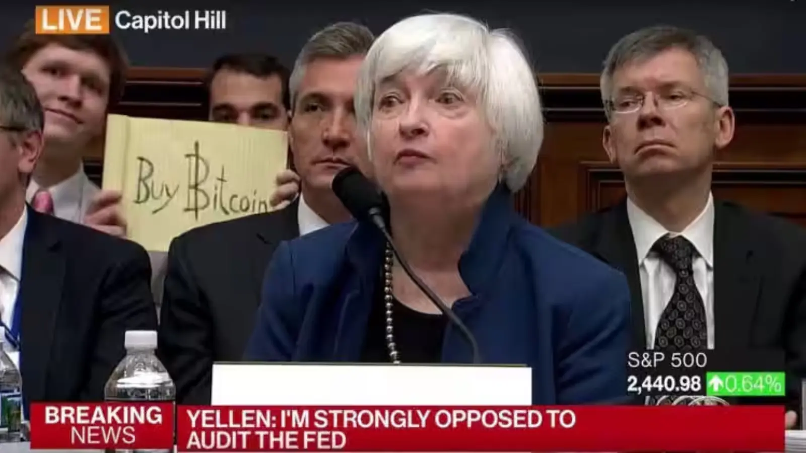 A photo of the Bitcoin event: The Bitcoin sign guy: how Bitcoin stole the headlines at a congressional hearing