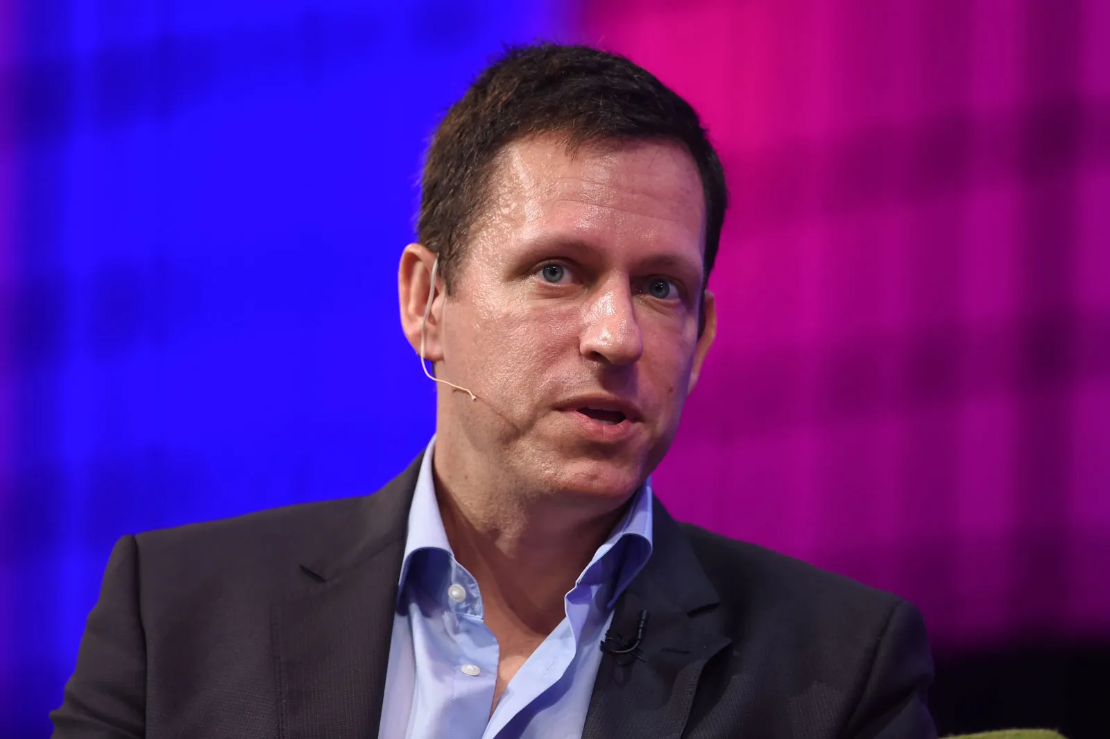 A photo representation of the Bitcoin event, Peter Thiel received his first Bitcoin and has been buying ever since